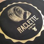 Raclette - Black Canvas with a Metallic Gold Heat Pressed Vinyl Logo