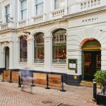 Mowgli Restaurant with Bespoke Wooden Framed Cafe Panels and Powder Coated Custom Painted Cafe Barrier Posts, Commercial Cafe Panels, Hospitality Cafe Panels, Panels for Cafes, printed cafe barriers