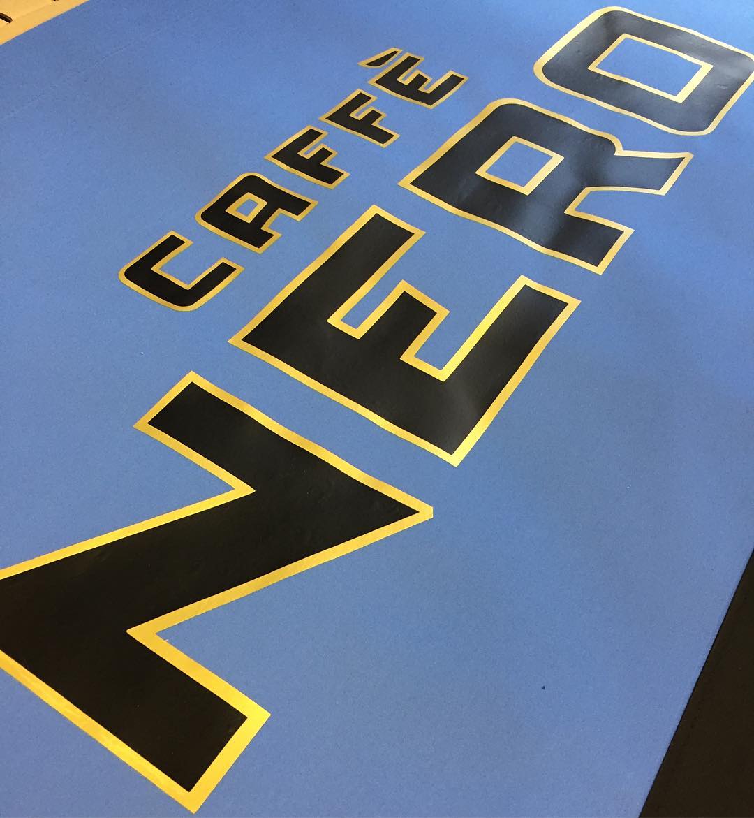 Caffe Nero - Light Blue Canvas with a Metallic Gold & Black Heat Pressed Vinyl Logo