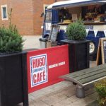 Valant Wooden Café Planter, Wooden Valant Planters and Red Canvas Banners for Hugo Cafe, printed café banners, bespoke café banners, handmade café banners, custom café banners, café screens, fabric café banners, wooden tall cafe planters, bespoke cafe planters, custom made planters, Restaurant planters, commercial planters, outdoor planters, wood planters