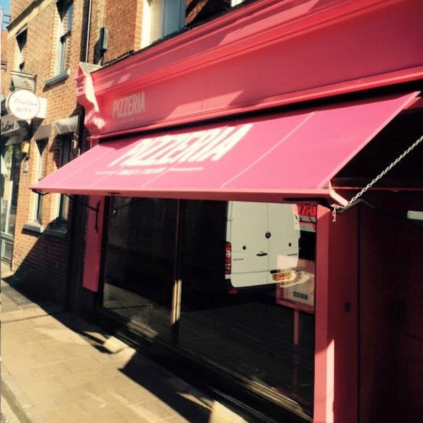 Pizzeria Awning in Pink with White Logo