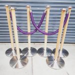 Natural Wooden Cafe Barrier Posts with Round Base & Naugahyde Leather Rope in Purple