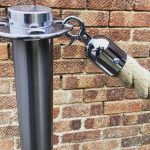 Advance Café Barrier Post with Polyhemp Rope against a Brick Wall