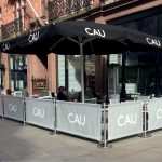 CAU Cafe Barrier System, printed café banners, bespoke café banners, handmade café banners, custom café banners, café screens, fabric café banners, original cafe barrier posts, stainless steel cafe barrier posts, metal stanchions, cafe screens