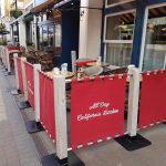 Limeyard Restaurant with our Wooden Rustic Café Barrier Posts and Canvas Cafe Banners, printed café banners, bespoke café banners, handmade café banners, custom café banners, café screens, fabric café banners