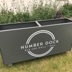 Humber Dock Forjado Metal Planters with their logo in White
