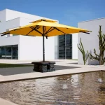 Big Ben Caravita Commercial Giant Umbrella in Yellow with Multicube Base Option