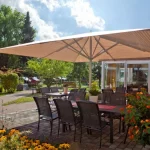 Big Ben Caravita Commercial Giant Umbrella in Striped Canvas