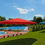 Caravita Supremo Commercial Giant Umbrella in Orange & Blue