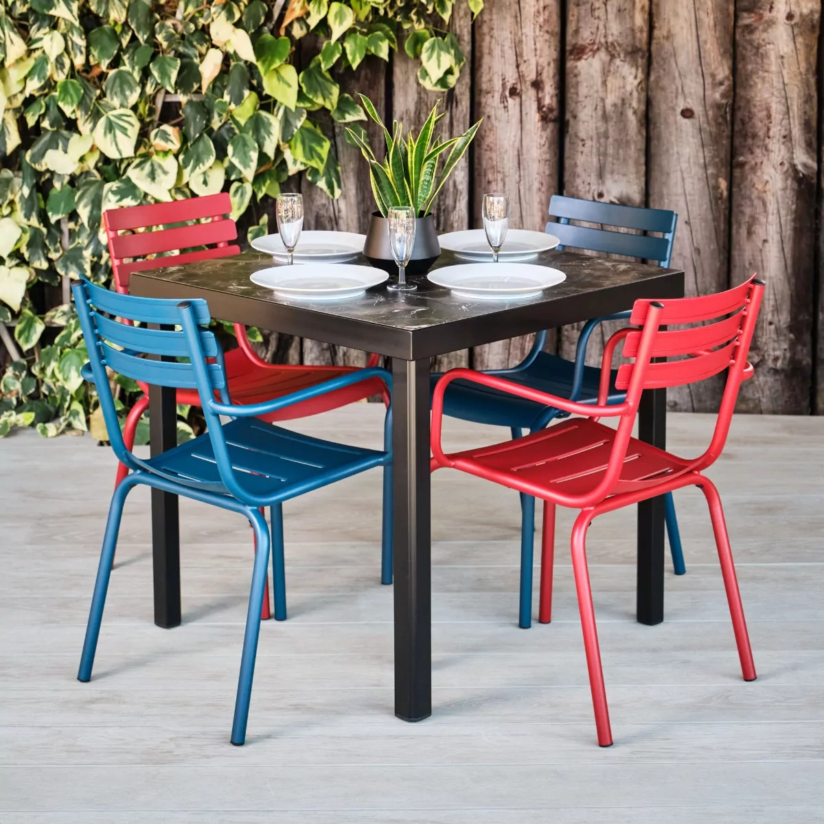 Indoor & Outdoor Furniture Stackable Armchairs in Red & Blue Hamsterley Range with Epping Marble Effect Square Table